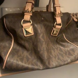 Michael kors Brown n beige purse Authentic abit dirty inside tho needs cleaning